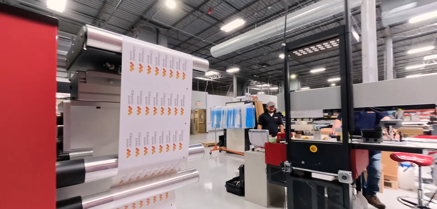 Freshly printed sheets on the press in the White Graphics manufacturing area